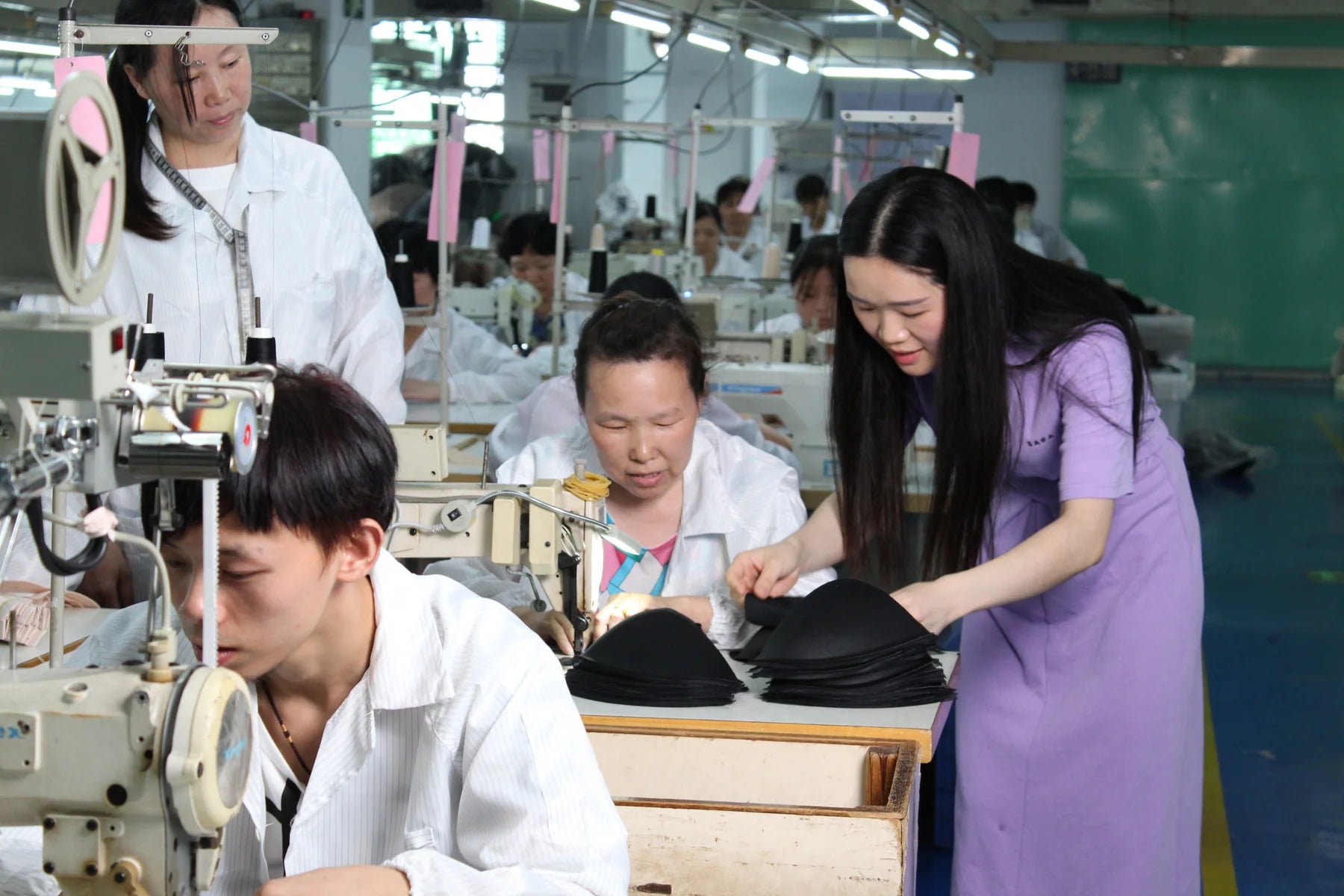 Garment construction discussion at a partner workshop